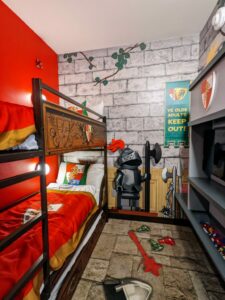 LEGOLAND New York: A room with a lego bunk bed and a tv.